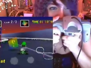 Geek daughter cums playing Mario Kart